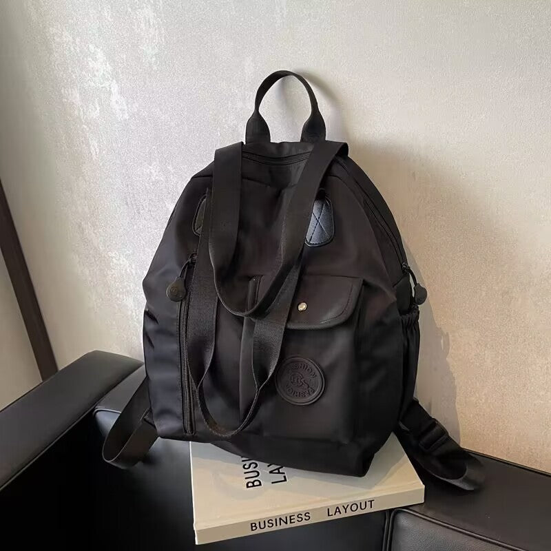 🎁【Oferta por tiempo limitado!】Mochila elegante, versátil, impermeable y de gran capacidad.