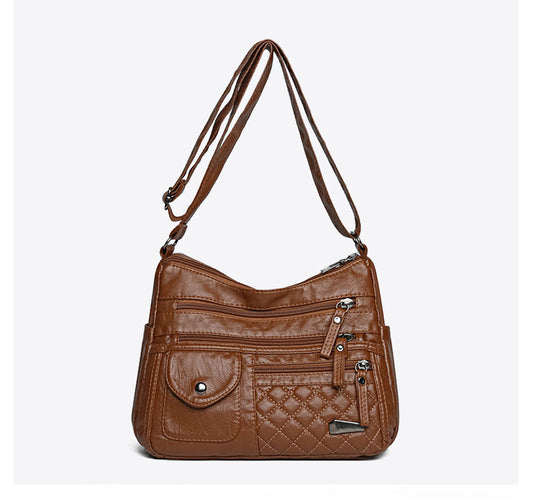 🔥Bolso de cuero suave de gran capacidad y múltiples capas para mujer